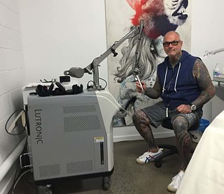 Paul Roberts in his tattoo laser studio In A Flash