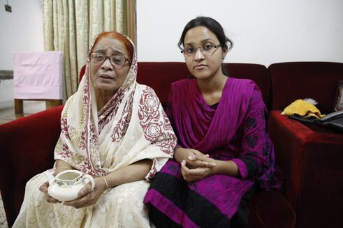 Respondent Tunazzina Sharmin with her grandmother Ahmadi Begum whose memories and experiences she has shared in the project