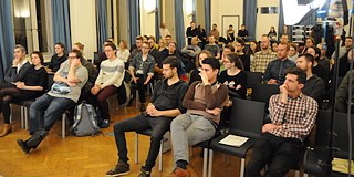 Visitors to the event Amman Same Sex Love at the Goethe-Institut in Prague. 