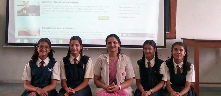 Yashashree Devdikar – here with pupils from ther Sinhgad City School in Pune – took part in the competition.
