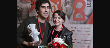 Roberto Collío e Isabel Orellana Guarello en la premiación durante el festival DOK Leipzig