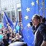 “Pulse of Europe” founder Daniel Röder at one of the demonstrations for Europe, surrounded by blue balloons and flags in Frankfurt am Main