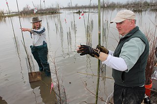 Mary O'Brien and Daniel McCormick working on a project in Louisiana.