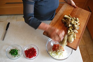 Slice the eggplants and add to the tomatoes and onions.