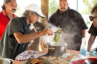 Charles Royal cooks a meal on the shores of Lake Rotoiti using ingredients found foraging in the bush. 