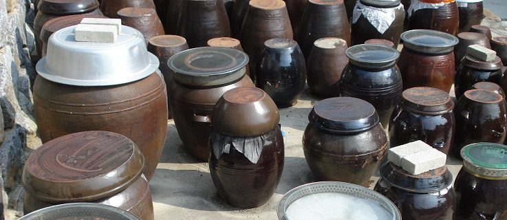 Onggi ceramic crocks filled with kimchi in Seoul, South Korea.