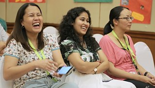 The teachers enjoy the presentations.