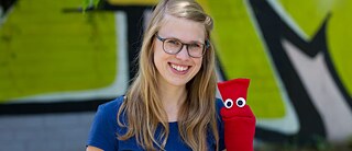 Deutsch mit Socke. Esther und Socke