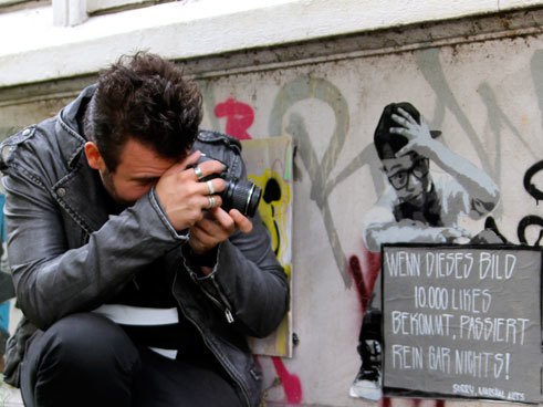 The German Art historian and Street Art expert Sebastian Hartmann