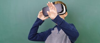 In the virtual world, learners can communicate and interact with characters in the foreign language.