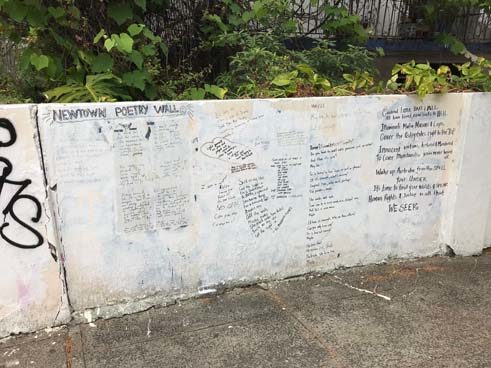 A poetry wall in Newtown where people can write down their poems and messages they’d like to share.