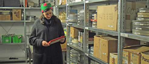Shirin Barghnavard in the storage room of the Harun Farocki Institut in Berlin.