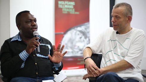 Wolfgang Tillmans talking with Patrick Mudekereza, director of the WAZA, Centre d’art de Lubumbashi.