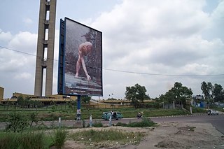 Panneau d'affichage à Kinshasa: Wolfgang Tillmans, Dan, 2009 © Photo: Goethe-Institut Kinshasa (RC) Panneau d'affichage à Kinshasa: Wolfgang Tillmans, Dan, 2009