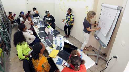 Workshop participants led by Virginie Dupray.