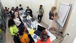 Workshop participants led by Virginie Dupray.