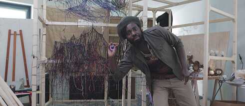 Intermedia artist Em’kal Eyongakpa in his studio.