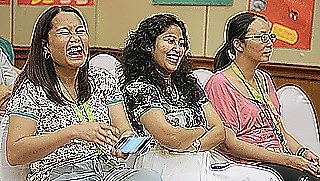 The teachers enjoy the presentations.