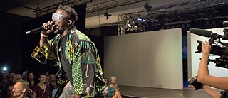 Performance in a brilliant outfit at Haus der Kulturen der Welt.