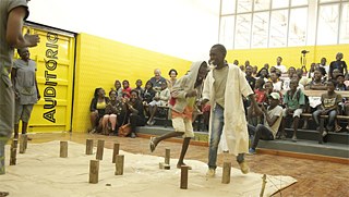 The audience plays along in Woodways.