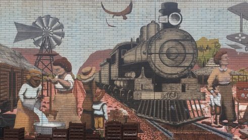 Ein Graffiti zeigt die Geschichte der australischen Einwanderer