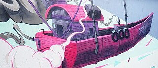 Graffiti von einem pinken Boot