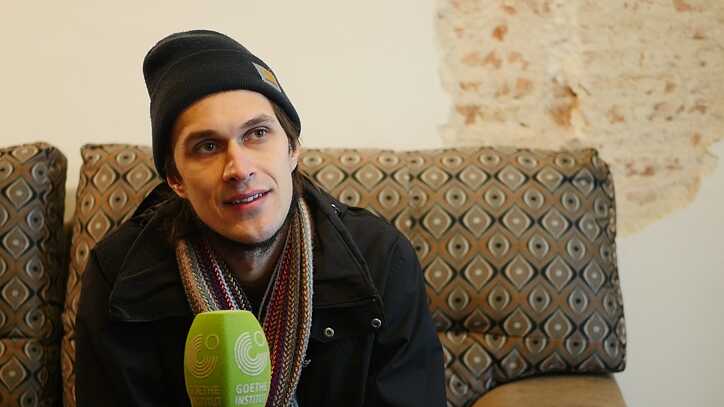 Jarek, a young Polish activist who’s been living in Barcelona for seven years 