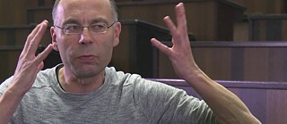 Stephan Lessenich in the Audimax of the LMU Munich