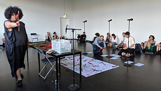 A performance by Jota Mombaça during the launch of C& América Latina