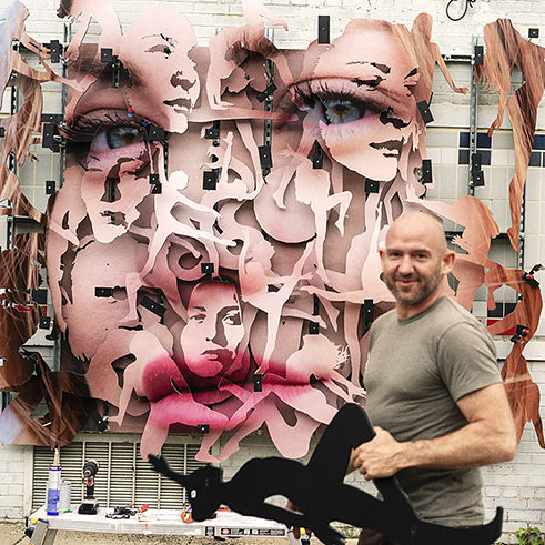 Mike Murphy, one of this year’s participating artists, puts together the festival’s first ever sculpture-based mural