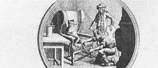 Deux tailleurs prennent les mesures des jambes du chat pour fabriquer les bottesers Maß für die Stiefel