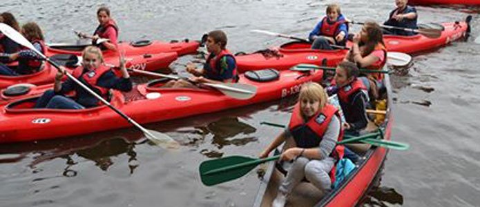 Menschen in mehreren Kanus | Foto: Olha Ivanyna