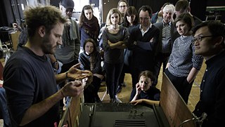 At the world/stage work meeting.