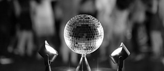 disco ball and dancing people