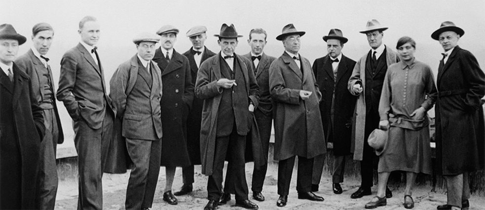 Group photo of Bauhaus masters in Dessau (1926): f. l. t. r: Josef Albers, Hinnerk Scheper, Georg Muche, László Moholy-Nagy, Herbert Bayer, Joost Schmidt, Walter Gropius, Marcel Breuer, Wassily Kandinsky, Paul Klee, Lyonel Feininger, Gunta Stölzl und Oskar Schlemmer.