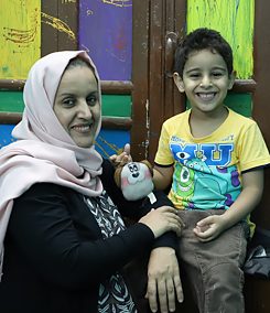 Fatima el-Mutahar avec son fils