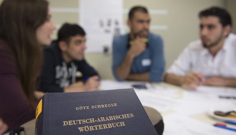 Refugees need to reach a high level of language proficiency to study in Germany.