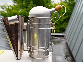 The smoker device used to calm the bees