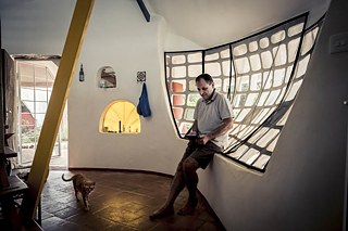 Residents of the Slump House in Ami