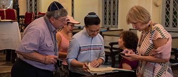 Sammy Samuels (centre) is the unofficial custodian of Yangon's Jewish community – and the last person to have been added to the community's birth register. 
