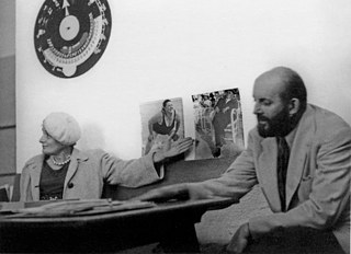 Guest Instructor Dorothea Lange and Ansel Adams discussing Photographs by Lisette Model with Students, 1948