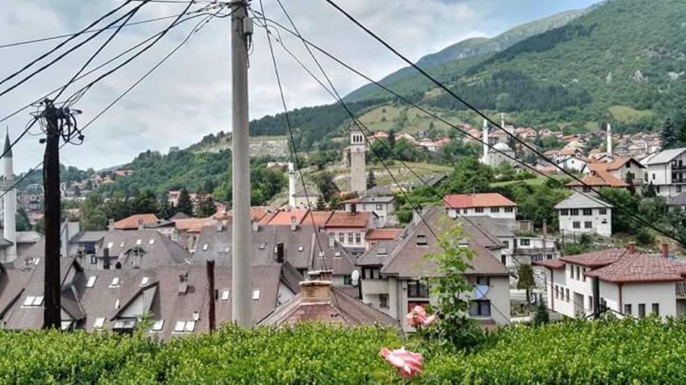 The roofs of the small town of Travnik, mountains in the background.