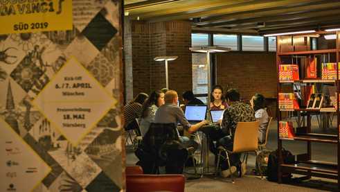 Culture enthusiasts, hackers and coders form teams. Often they meet each other at the Hackathon for the first time