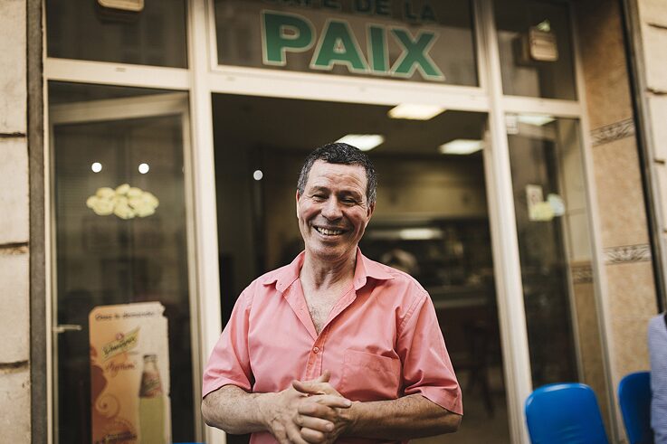 “You're free when you live in peace,” he says, “in harmony with those around you.” Hence the name of his establishment, Café de la Paix, right across from his olive tree, an enduring symbol of peace.