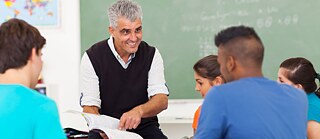 Teacher with students