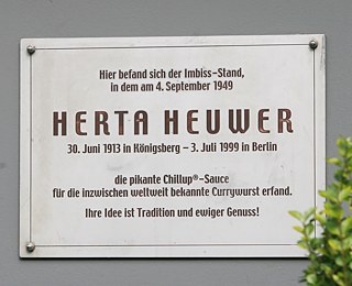 Memorial plaque to the mother of the <i>currywurst</i> in Berlin. 