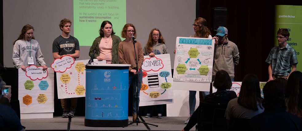 Students presenting their ideas after the workshop "Sustainable consumption"