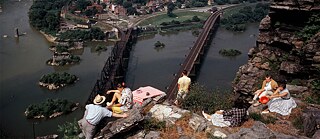 People picnic on the rocky heights that overlook Harpers Ferry in Maryland, 1962
