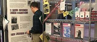 Exhibit pieces and guests at the mini exhibit at the DC Center for the LGBT Community