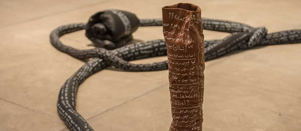 The rice-filled leather forms by Lucas Odahara, detail from Lingual (descending), 2019